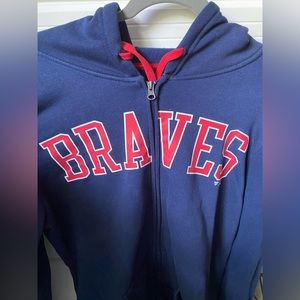 red white and navy blue braves zip up hoodie, with Atlanta A logo on left sleeve